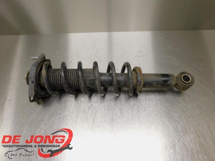 Schokdemper links-achter van een Toyota Corolla Verso, Auto-onderdelen, Ophanging en Onderstel, Toyota, Gebruikt, 3 maanden garantie