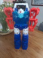 Speelgoed robot in hard plastiek met geluid en ogen die kleu, Antiek en Kunst, Antiek | Speelgoed, Ophalen