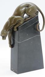 Bronzen panter op marmeren blok, Ophalen