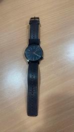 Horloge Komono, Handtassen en Accessoires, Ophalen, Zo goed als nieuw, Zwart