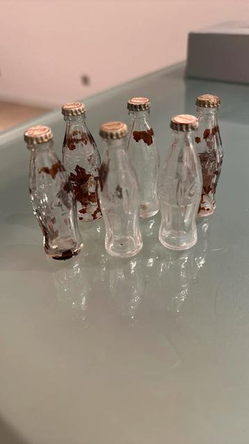 6 oude miniatuur colaflesjes beschikbaar voor biedingen