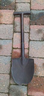 Pelle en T US, Enlèvement