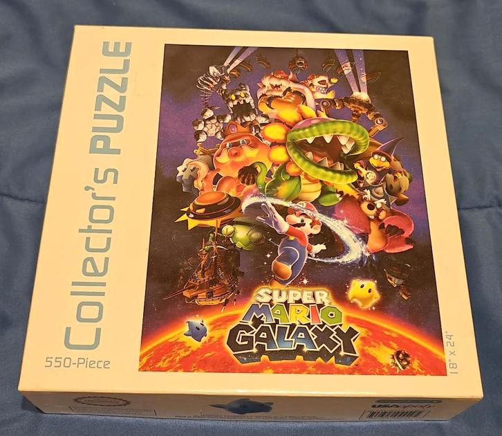 Super Mario Galaxy collector's puzzle - 550 st., Hobby en Vrije tijd, Denksport en Puzzels, Zo goed als nieuw, Legpuzzel, 500 t/m 1500 stukjes