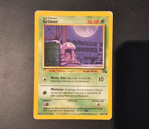grimer #48 - fossil set, Hobby en Vrije tijd, Verzamelkaartspellen | Pokémon, Gebruikt, Losse kaart, Foil, Ophalen of Verzenden