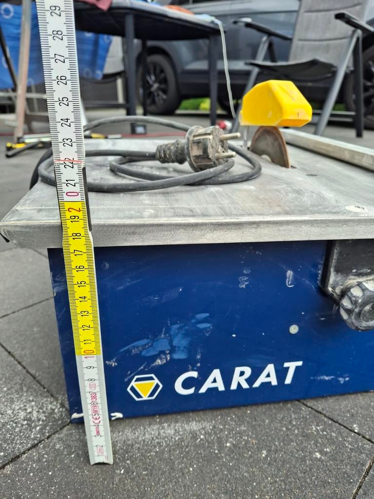 Scie à carreaux Carat, Enlèvement