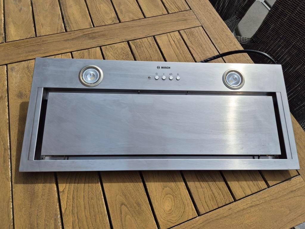 Bosch MSUN72 70 cm op 30 cm, Ophalen