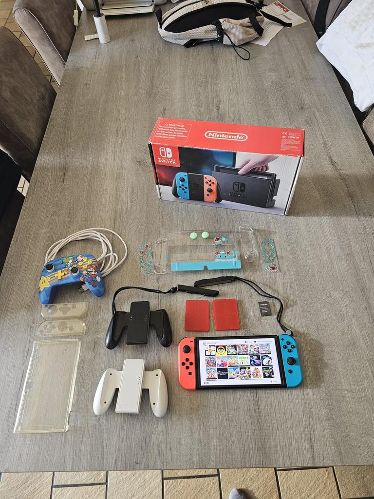 Nintendo Switch Oled Versie 100 Spellen, Games en Spelcomputers, Spelcomputers | Nintendo NES, Ophalen, Zo goed als nieuw