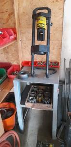 Pers hydrauliek slangen. Slangenpers, Ophalen