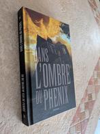 Dans l'ombre du Phénix (Traduction Charles de Trazegnies)., Manteau.., Envoi, Belgique, Comme neuf