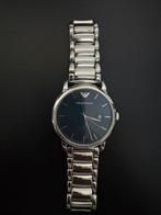 Emporio Armani horloge, Ophalen