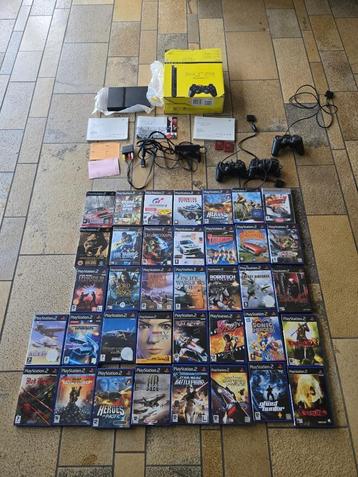 PlayStation 2 in originele doos met controllers en 37 games! beschikbaar voor biedingen