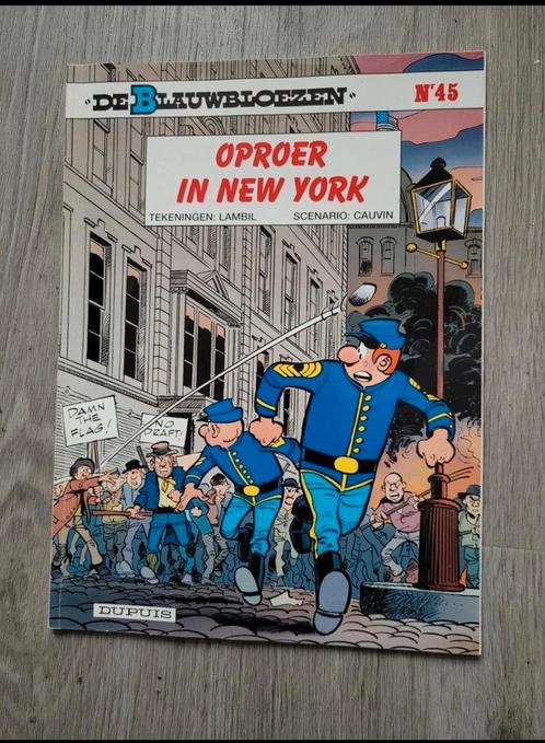 De Blauwbloezen Oproer in New York (2002), Boeken, Stripverhalen, Zo goed als nieuw, Eén stripboek, Ophalen of Verzenden