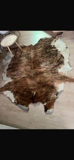 Tapis peau de vache, Ophalen, Gebruikt