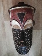 Afrikaans masker, Ophalen