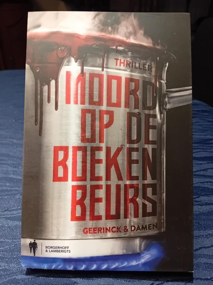 Moord op de Boekenbeurs, Boeken, Thrillers, Zo goed als nieuw, België, Ophalen of Verzenden