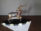 art deco beeld, Ophalen