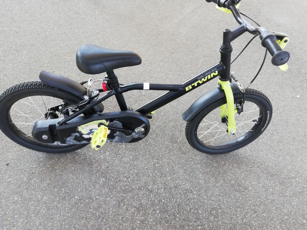 Jongens fiets b twin, Ophalen