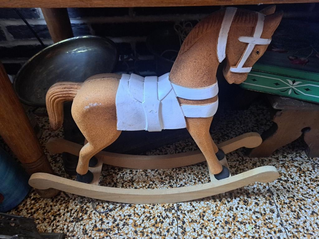 Ancien cheval à bascules, Ophalen