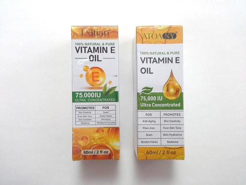 Huile de vitamine E - Lot de 2 flacons neufs de 60 ml, Handtassen en Accessoires, Uiterlijk | Gezichtsverzorging, Nieuw, Verzorging