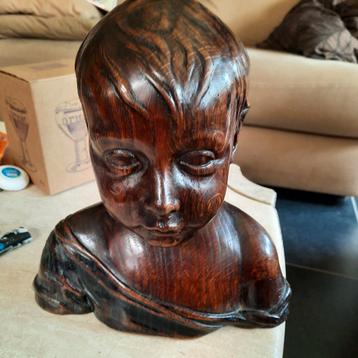 Kinderhoofdje ( buste ) in exotisch hout . 26 cm hoog . beschikbaar voor biedingen