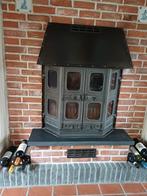 Inbouw houtkachel van Dovre, Ophalen