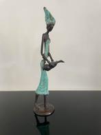 Bronzen beeld, Ophalen