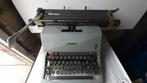 Oude schrijfmachine OLIVETTI, Ophalen