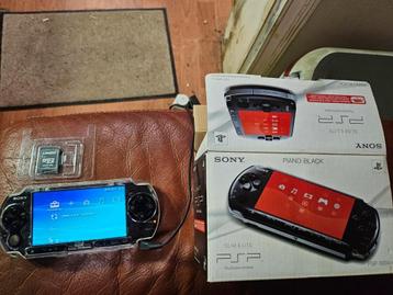 Gebruikte PSP 3004 zwarte partij + 11 games + accessoires beschikbaar voor biedingen