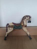 Antiek houten paard, Ophalen