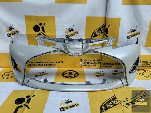 Voorbumper Toyota Yaris Facelift voorbumper 52119-K0050, Auto-onderdelen, Carrosserie, Bumper, Toyota, Voor, Gebruikt