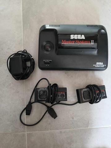 TTT lot Sega master system + games disponible aux enchères