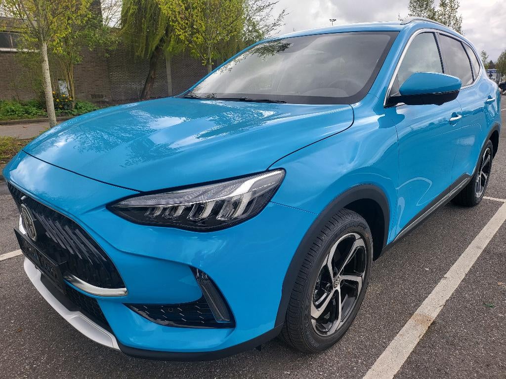 MG HS 1.5 LUXURY  maar 1.400 km -8PK- 119kW- 162pk -Automaat, Auto's, MG, Automaat, 174 g/km, 4 cilinders, Blauw