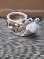 Bloempot slak en slakken beeldjes, Ophalen