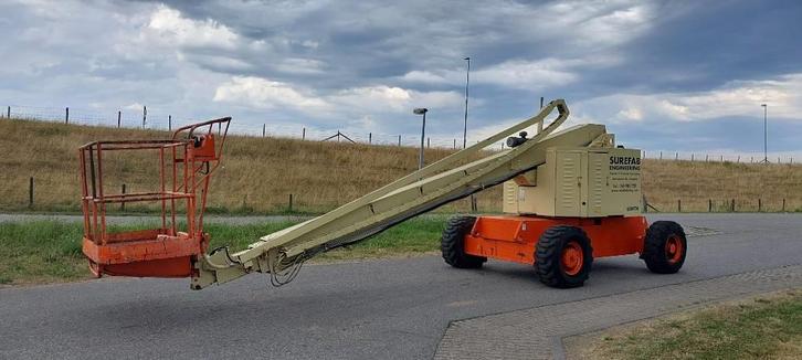 JLG 60 HTH telescoop hoogwerker 20M 60 hth (bj 1994), Zakelijke goederen, Machines en Bouw | Liften, Steigers en Ladders