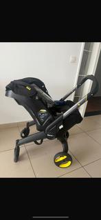 Buggy + Autostoel Doona €299 +regenhoes +verkleiningskussen, Ophalen of Verzenden, Zo goed als nieuw, Maxi-Cosi, Regenhoes