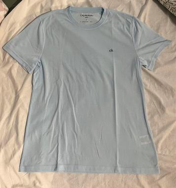 Lichtblauwe T-shirt van Calvin Klein beschikbaar voor biedingen