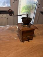 Antieke koffiemolen, Ophalen