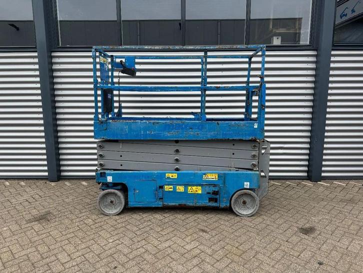 Genie GS2632 Hoogwerker Schaarhoogwerker (bj 2014), Zakelijke goederen, Machines en Bouw | Liften, Steigers en Ladders