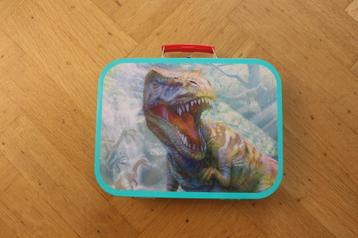 Puzzels dino's in koffer beschikbaar voor biedingen