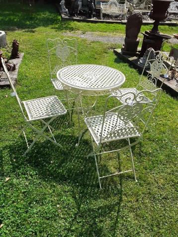 Superbe set de jardin en fer forgé et fonte (4chaises et tab