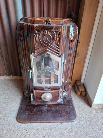 Antique Emaille  French Art Deco houtkachel in goede staat beschikbaar voor biedingen