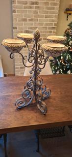 Zware kandelaar : smeedijzer, Ophalen