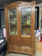 Authentieke kast met loden glasramen, Enlèvement