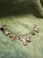 Vintage zilveren bedelarmband, Ophalen