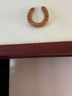 Paard ijzer, Ophalen