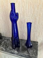 blauwe vaasjes, Ophalen