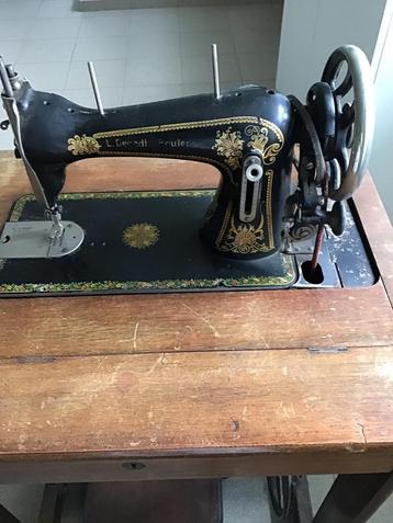 Très ancienne machine à coudre +, Enlèvement