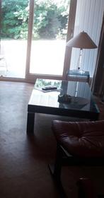 JC CHARLES Walt salontafel. 1980 Zwart gelakt met vergulding, Ophalen