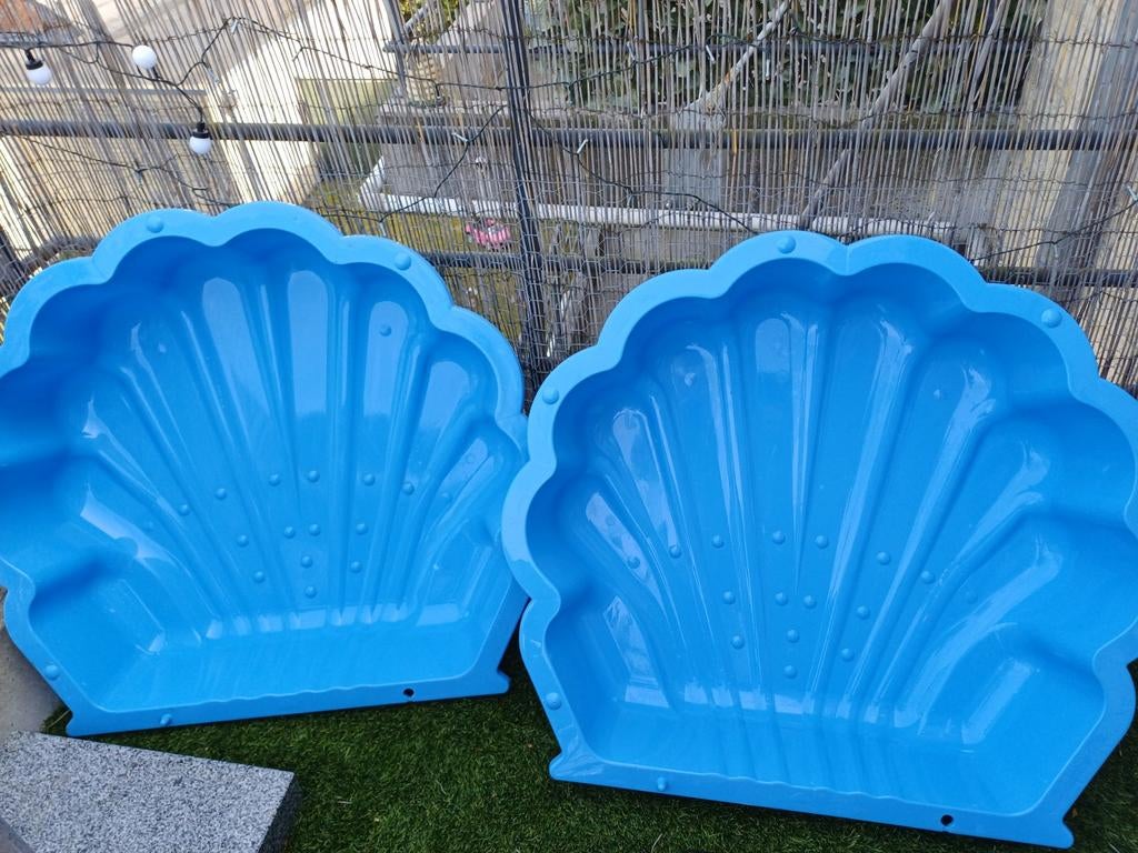 Zandbak schelp, Ophalen