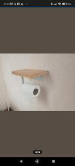 WC papierhouder, Ophalen